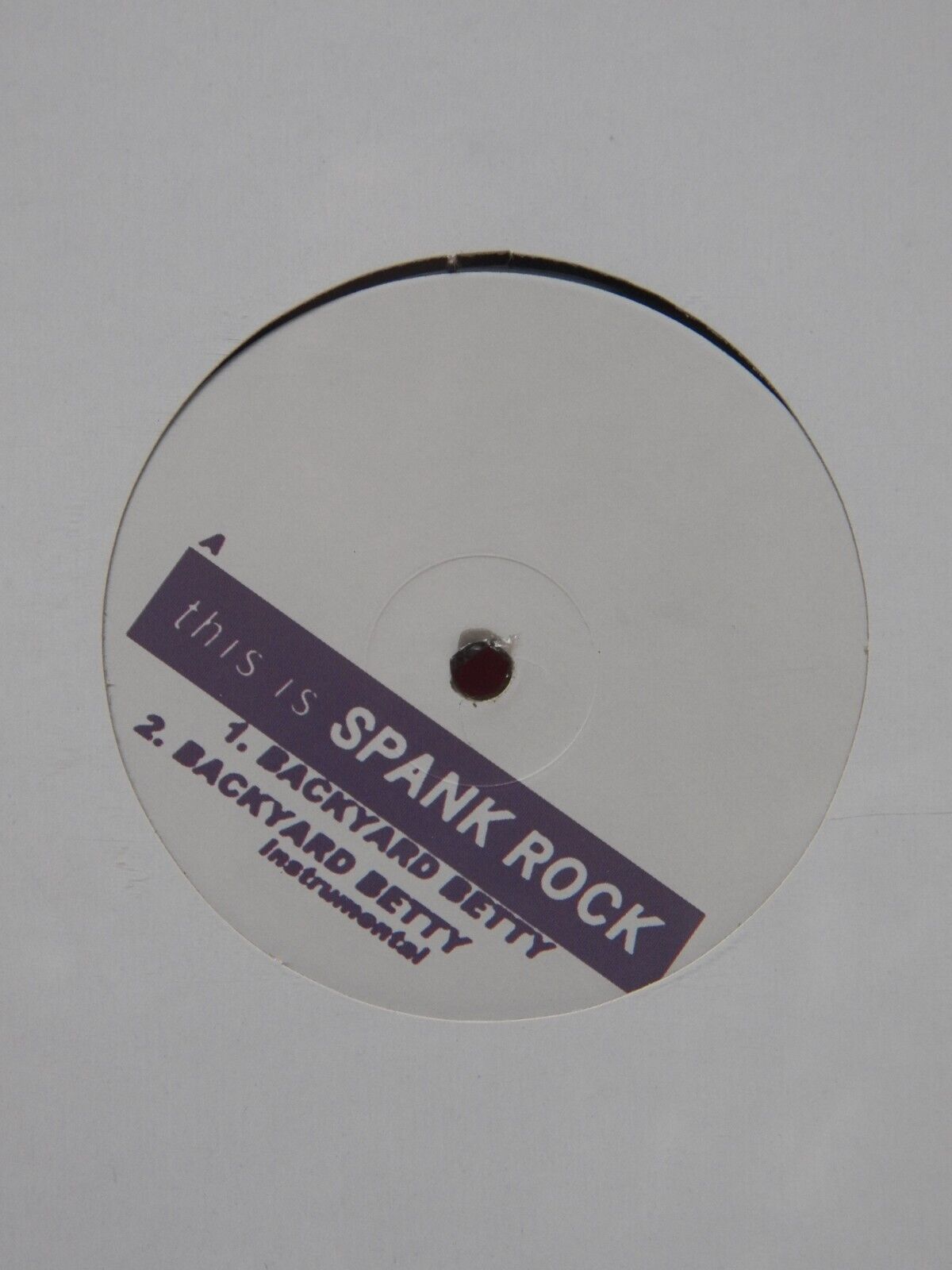 Sealed 12" Single Spank Rock Backyard Betty 2005 Big Dada Recordings BD86 Sealed 12" Single Spank Rock Backyard Betty 2005 Big Dada Recordings BD86