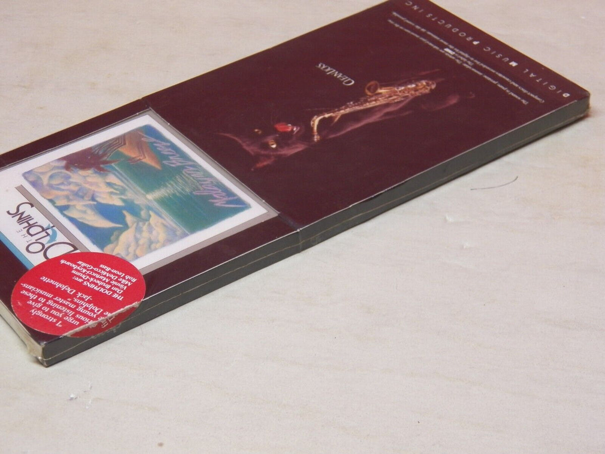 Sealed CD Longbox The Dolphins Malayan Breeze 1990 DMP CD-474 Sealed CD Longbox The Dolphins Malayan Breeze 1990 DMP CD-474