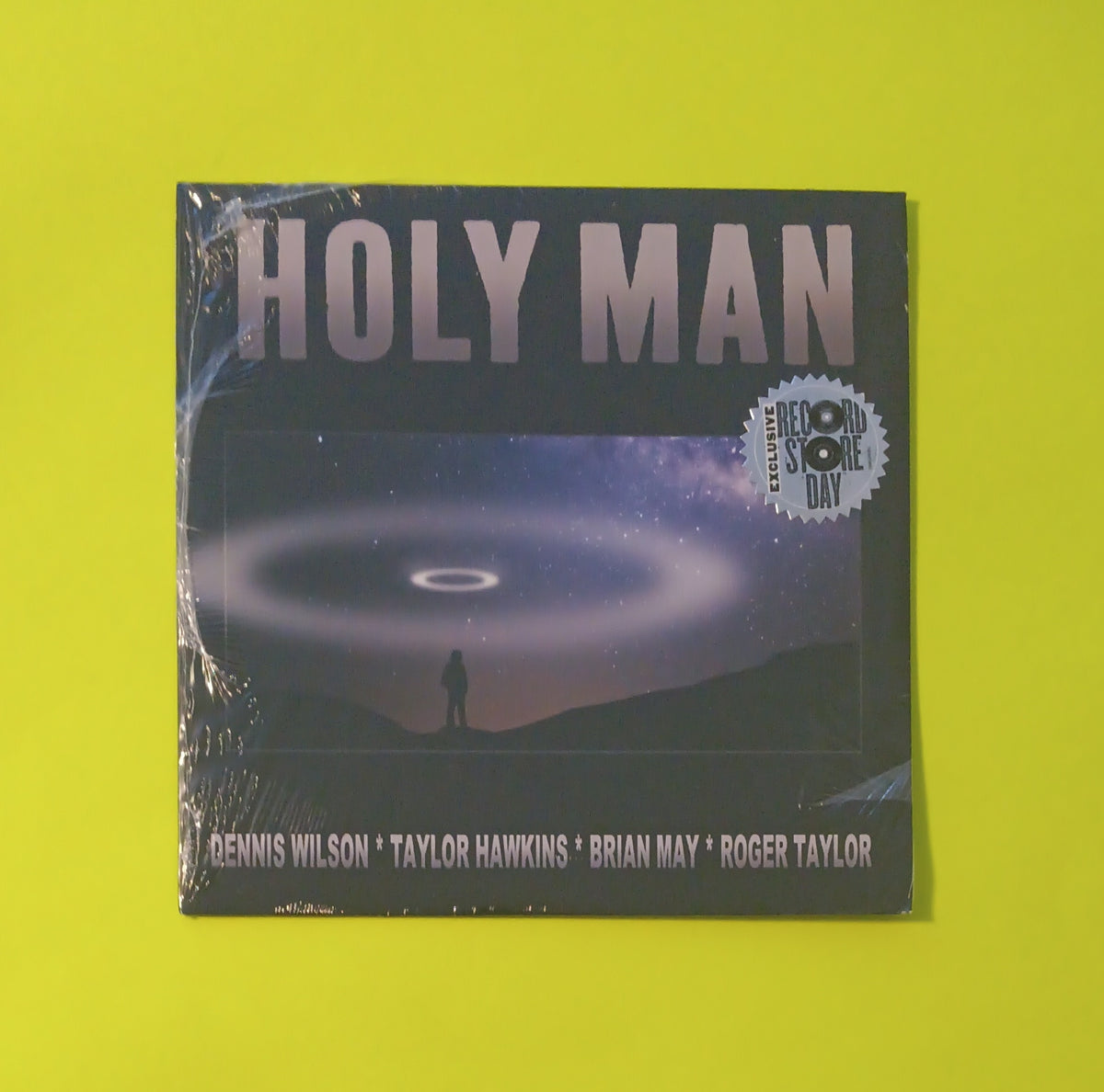 Dennis Wilson, Taylor Hawkins, Brian May, Roger Taylor - Holy Man - 2019 - 19075935927 New - Sealed - 7" RSD Vinyl Promo Dennis Wilson, Taylor Hawkins, Brian May, Roger Taylor - Holy Man - 2019 - 19075935927 New - Sealed - 7" RSD Vinyl Promo
