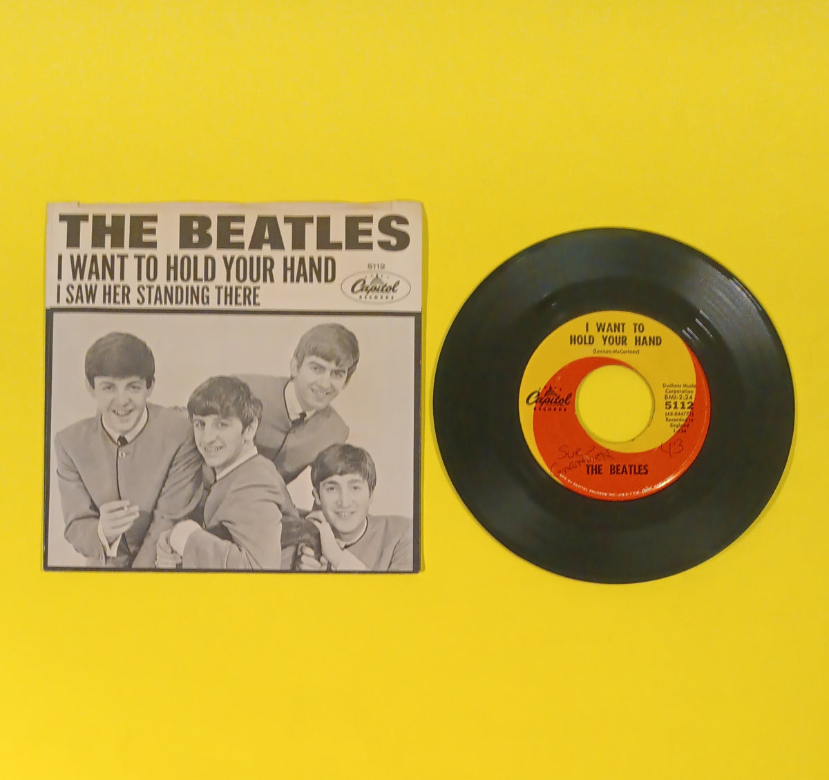 The Beatles - I Want to Hold Your Hand / I Saw Her... (Gil credit 7") - 1964 - 5112 Used - VG+ - Vinyl The Beatles - I Want to Hold Your Hand / I Saw Her... (Gil credit 7") - 1964 - 5112 Used - VG+ - Vinyl