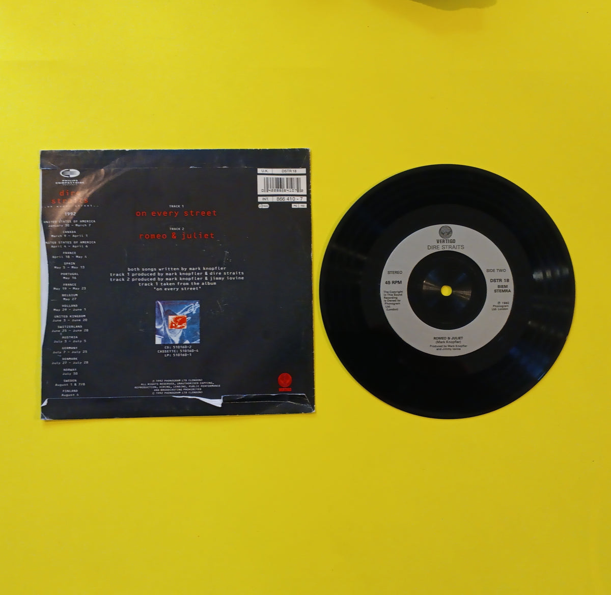 Dire Straits - On Every Street / Romeo & Juliet - 1992 - DSTR 18 Used - EX - 7" Vinyl Dire Straits - On Every Street / Romeo & Juliet - 1992 - DSTR 18 Used - EX - 7" Vinyl