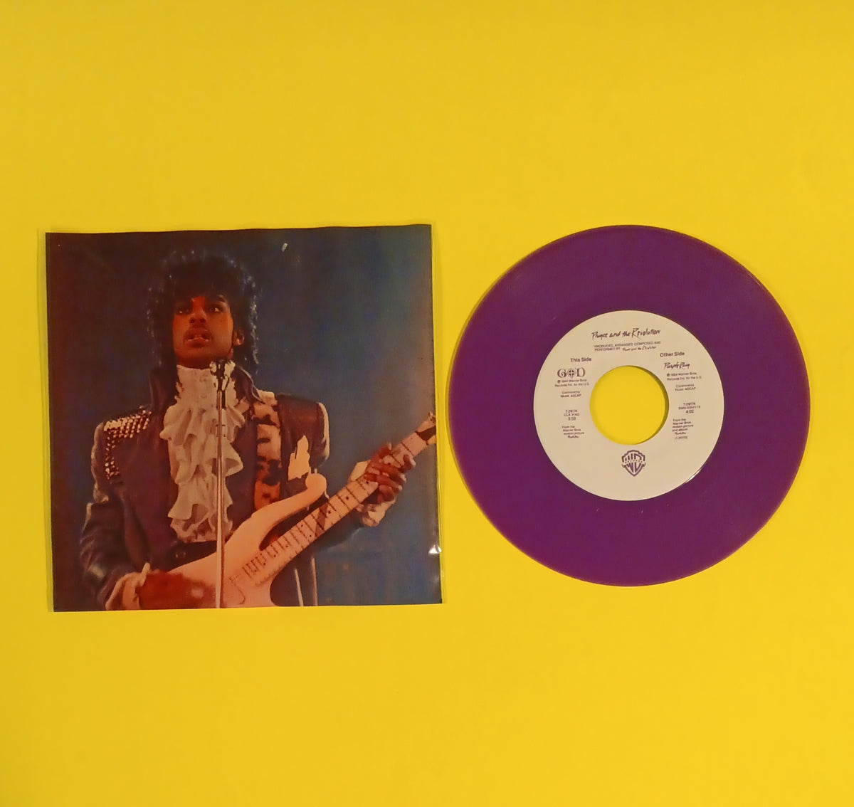 Prince - Purple Rain / God (Purple 7" w. Poly Sleeve) - 1984 - 7-29174 Used - NM - Vinyl
