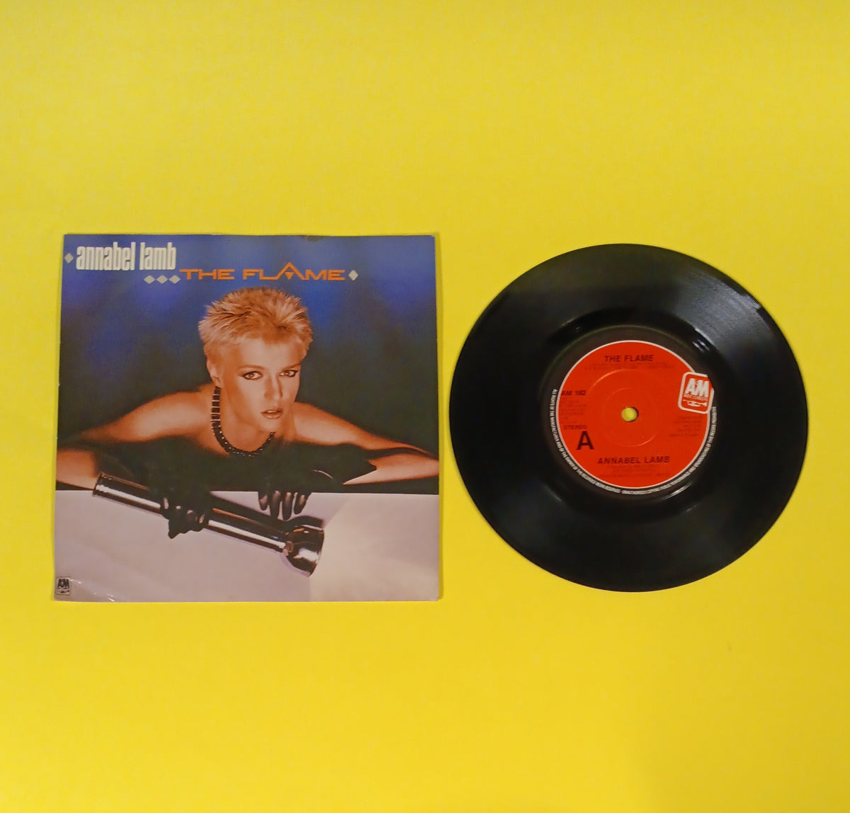 Annabel Lamb - The Flame / Sisters of Mercy (UK 7") - 1984 - AM 182 Used - EX - Vinyl