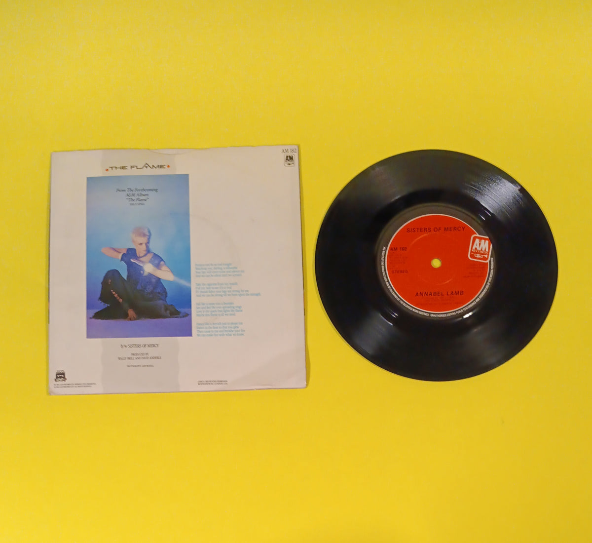 Annabel Lamb - The Flame / Sisters of Mercy (UK 7") - 1984 - AM 182 Used - EX - Vinyl