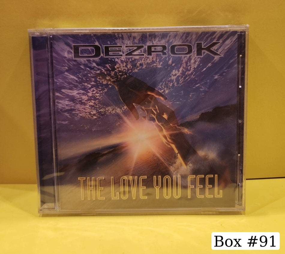 Lot #00126 - Dezrok - The Love You Feel - 2006 - 00101-8 New - Sealed - Wholesale - CDS