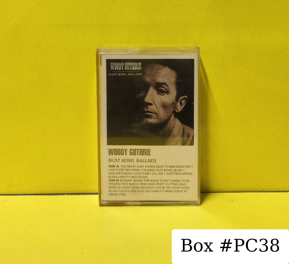 Woody Guthrie - Dust Bowl Ballads - 1991 - C-1040 - Used - EX - Cassettes - Reissue - Mono - Clear Tape Shell