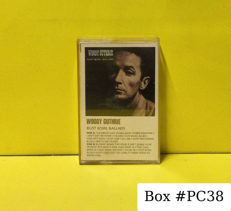 Woody Guthrie - Dust Bowl Ballads - 1991 - C-1040 - Used - EX - Cassettes - Reissue - Mono - Clear Tape Shell