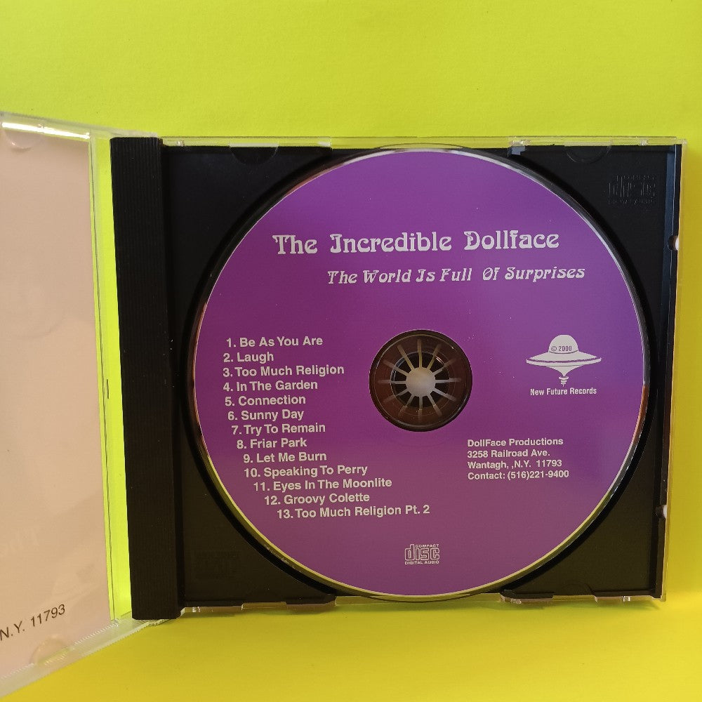 The Incredible Dollface - The World Is Full Of Surprises - 2002 - Used - EX - CDs