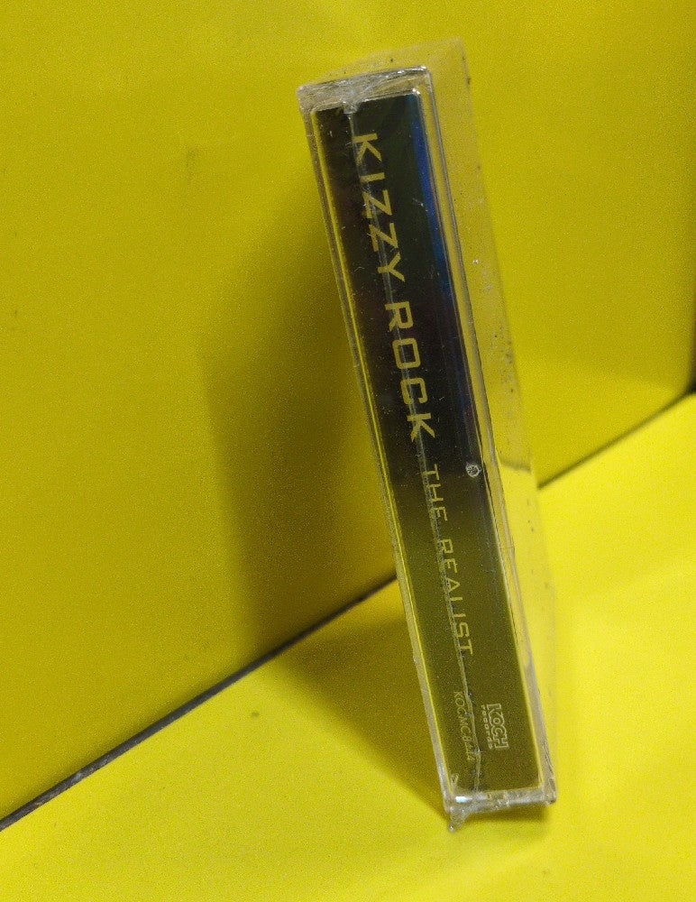 Kizzy Rock - The Realist - 2002 - KOC-MC-8444 - New - Sealed - Cassettes