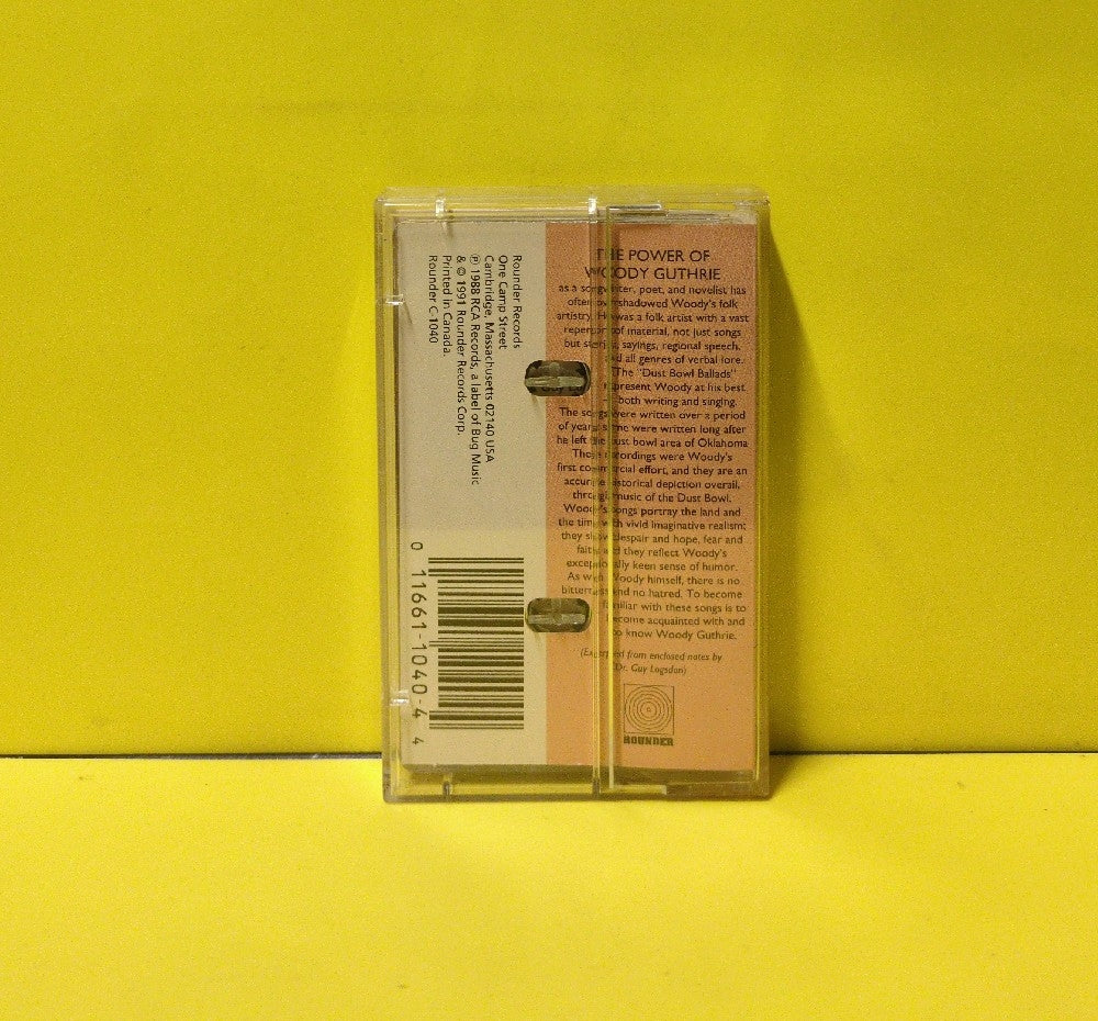 Woody Guthrie - Dust Bowl Ballads - 1991 - C-1040 - Used - EX - Cassettes - Reissue - Mono - Clear Tape Shell