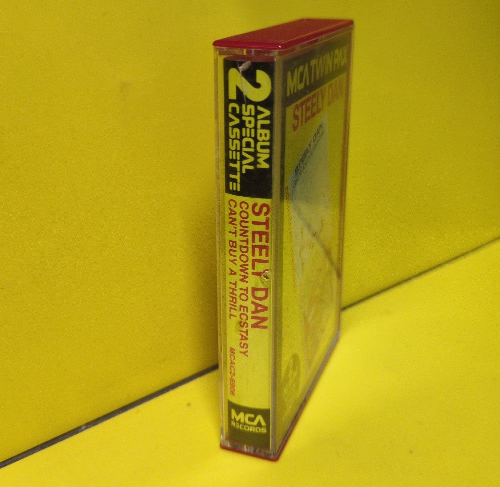 Steely Dan - Countdown To Ecstasy / Can't Buy A Thrill - 1982 - MCAC2-6906 - Used - EX - Cassettes - White Tape Shell