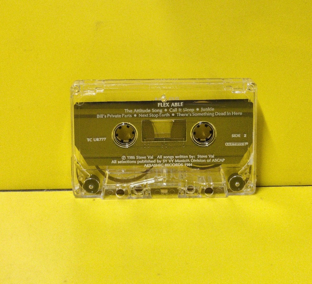 Steve Vai - Flex-Able - 1986 - URCT 777 - Used - EX - Cassettes - Reissue - Clear Tape Shell
