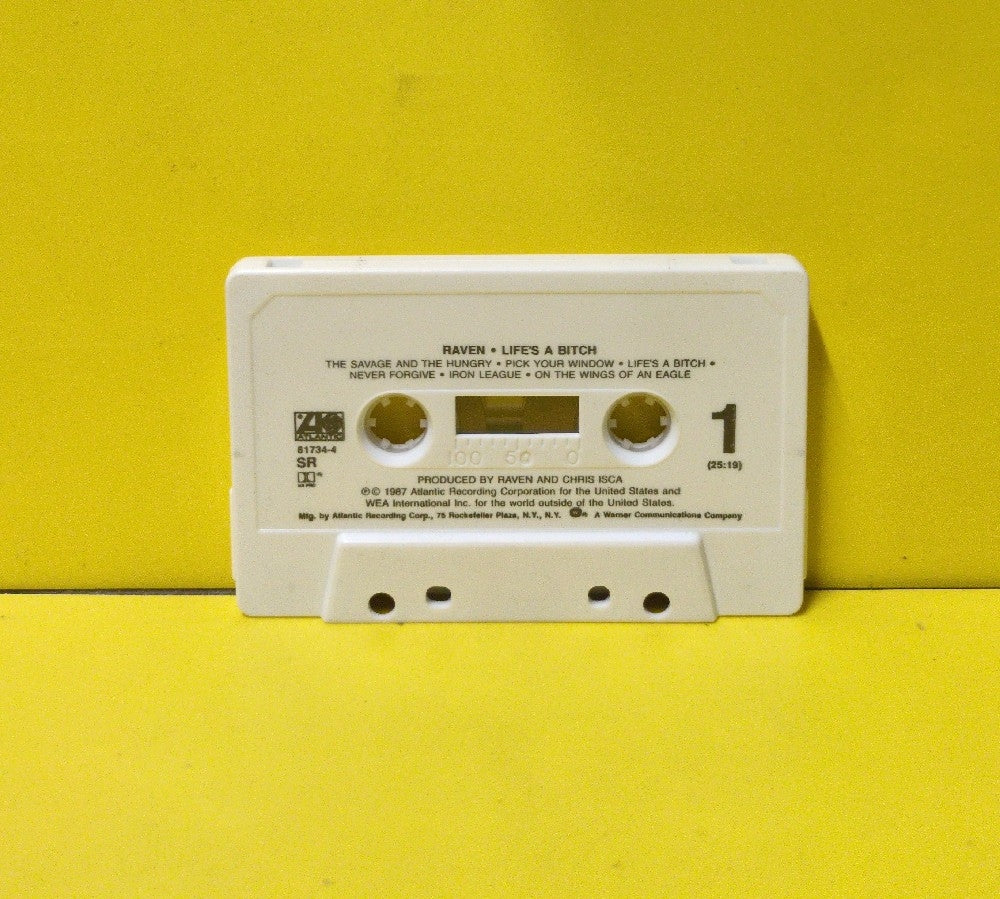 Raven - Life's A Bitch - 1987 - 7 81734-4 - Used - EX - Cassettes