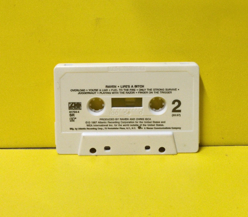Raven - Life's A Bitch - 1987 - 7 81734-4 - Used - EX - Cassettes