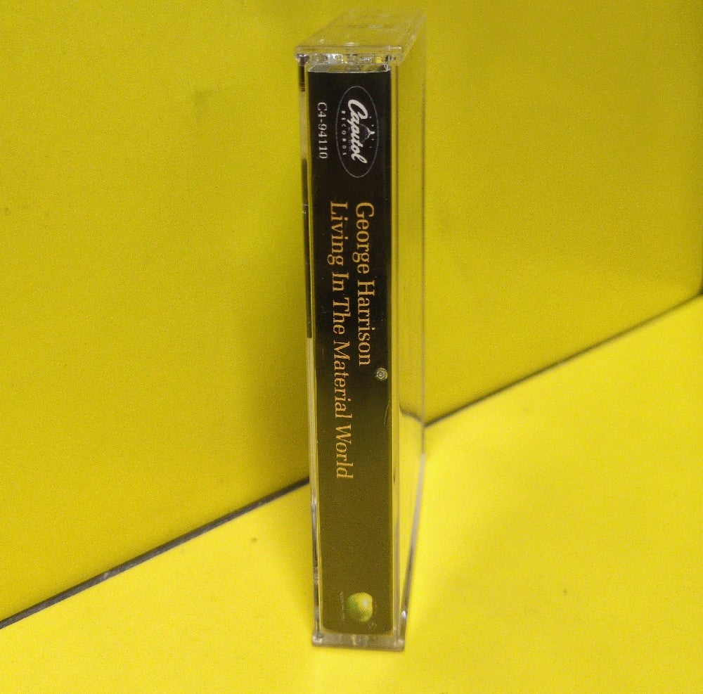 George Harrison - Living In The Material World - 1991 - C4-94110 - Used - EX - Cassettes - Reissue - Clear Tape Shell