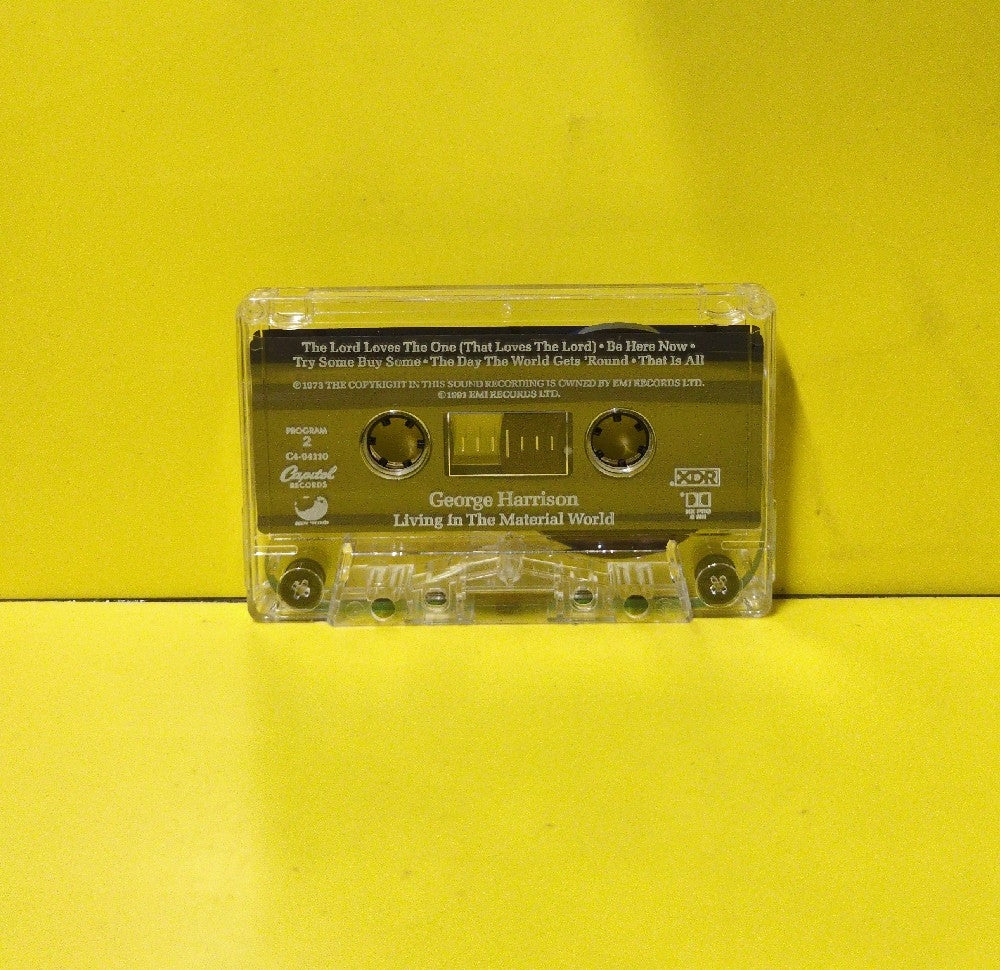 George Harrison - Living In The Material World - 1991 - C4-94110 - Used - EX - Cassettes - Reissue - Clear Tape Shell